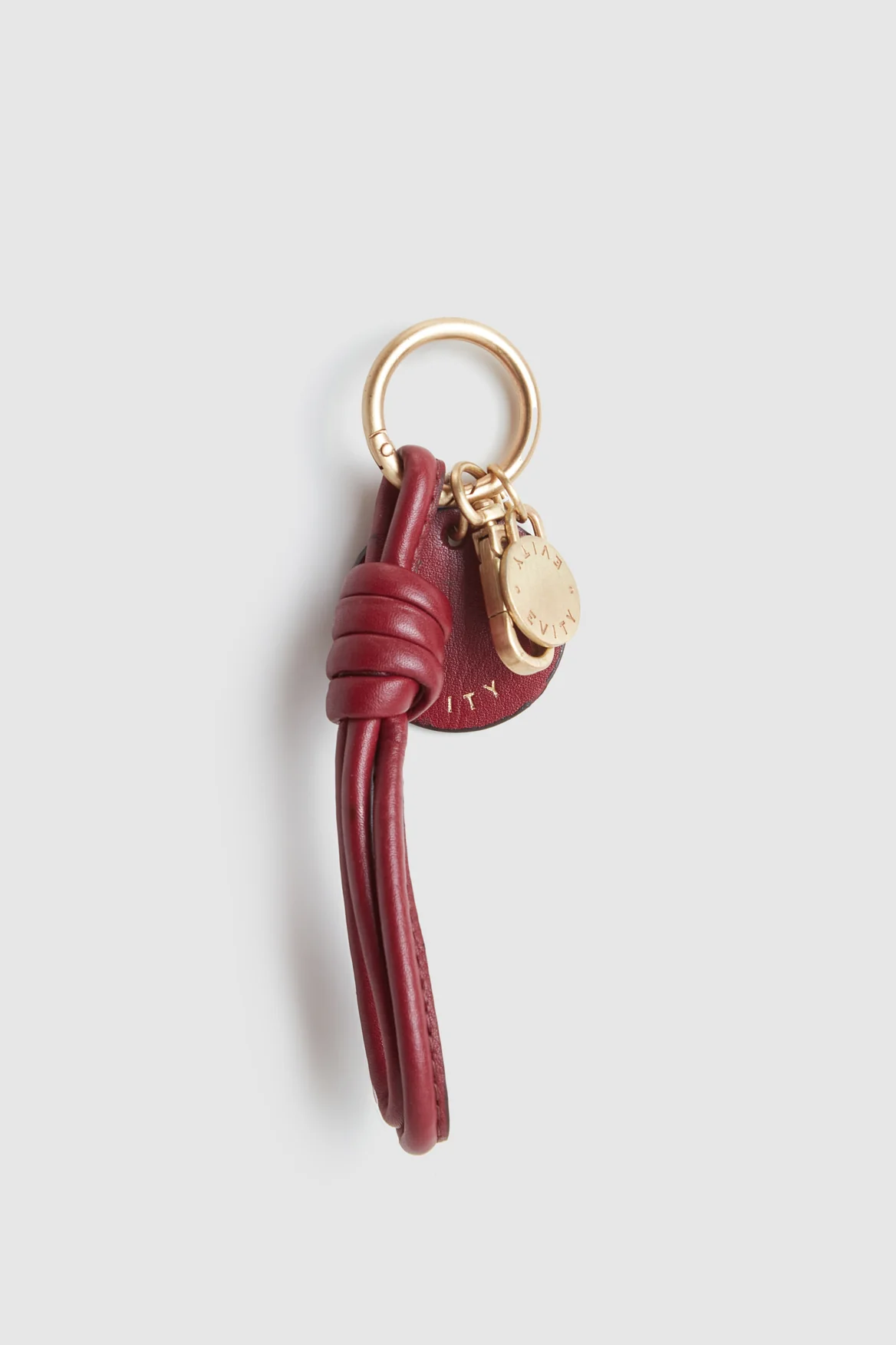 975-leather-knot-charm-2.webp Leather Knot Charm